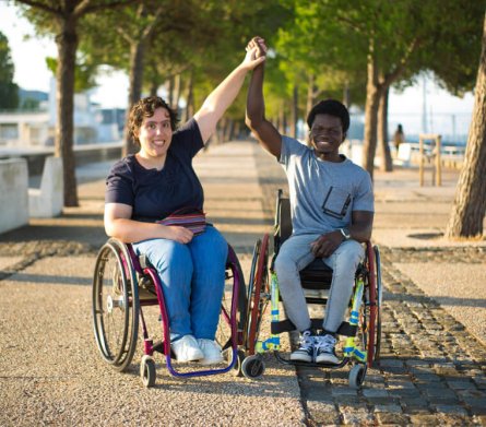 portrait-biracial-family-romantic-date-park-african-american-man-caucasian-woman-wheelchairs-holding-hands-smiling-love-relationship-happiness-concept